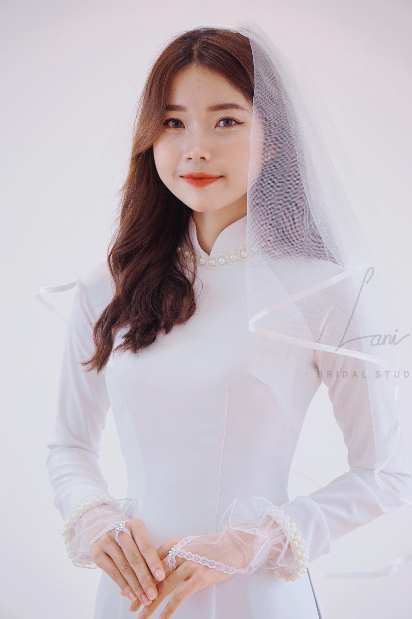 ÁO DÀI CÔ DÂU ĐÍNH NGỌC TRUYỀN THỐNG